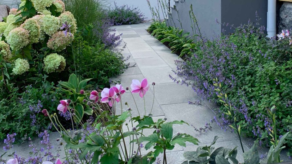 A footpath of Offerdal slate with beautiful planting.