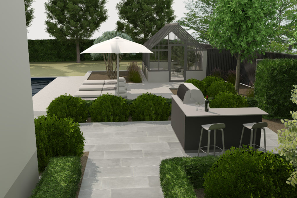 Ett utekök på en terrass med uteflis i skiffer i en modern och minimalistisk trädgård.