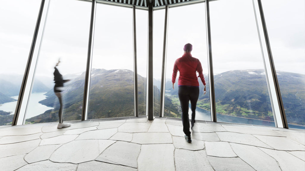 A viewing room at Loen Skylift with Oppdal flagstones on the floor and with a view of fjords and mountains.