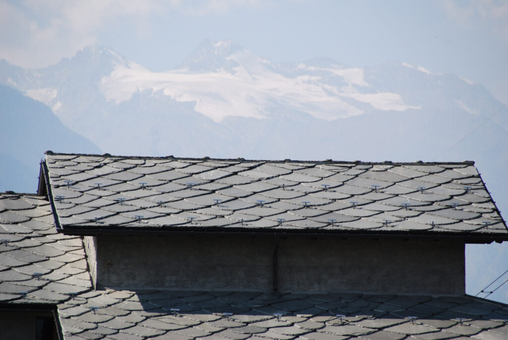 A building with a slate roof in Oppdal slate in the Italian Alps