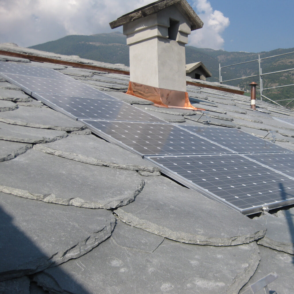 Detail image of a slate roof of Oppdal slate with solar panel